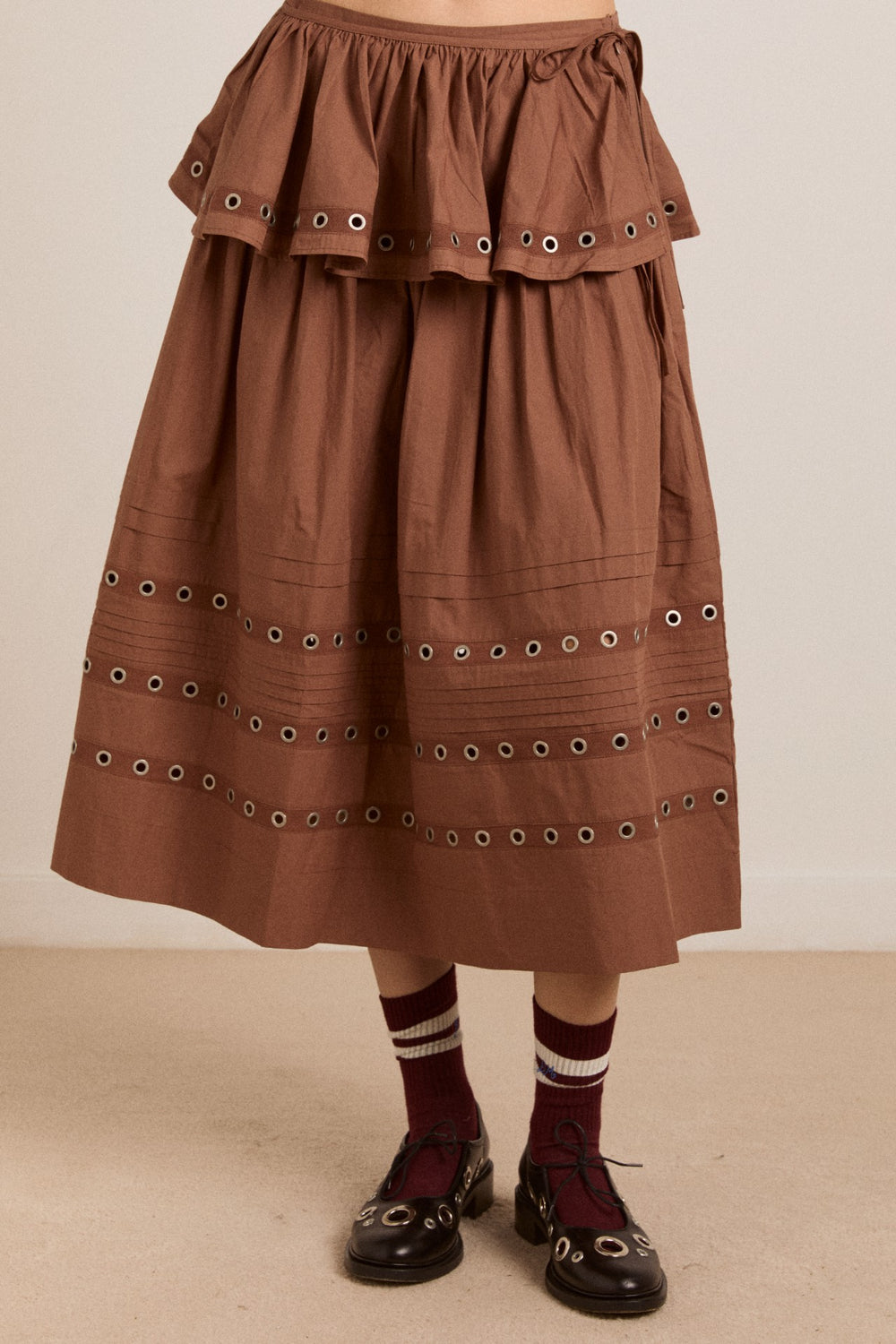 anika eyelet skirt with ruffle belt- tan